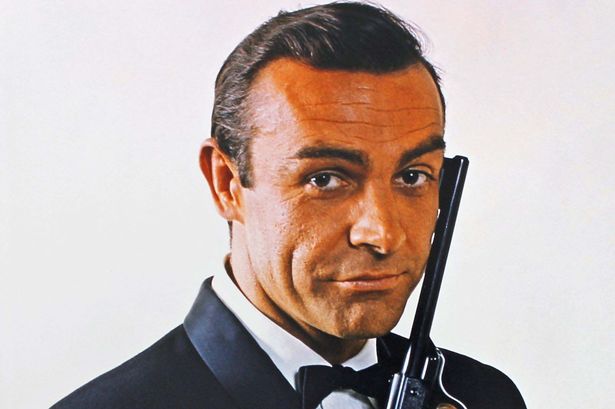 0_signed-photo-of-Sean-Connery-posing-as-James-Bond