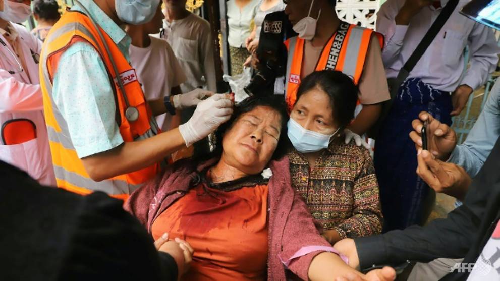 a-protester-receives-treatment-after-being-injured-during-the-clashes-1613816101729-2