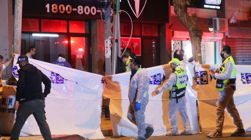 israeli_security_forces_gather_at_the_site_of_an_attack_that_left_two_israeli_police_dead_in_the_northern_city_of_hadera._afp