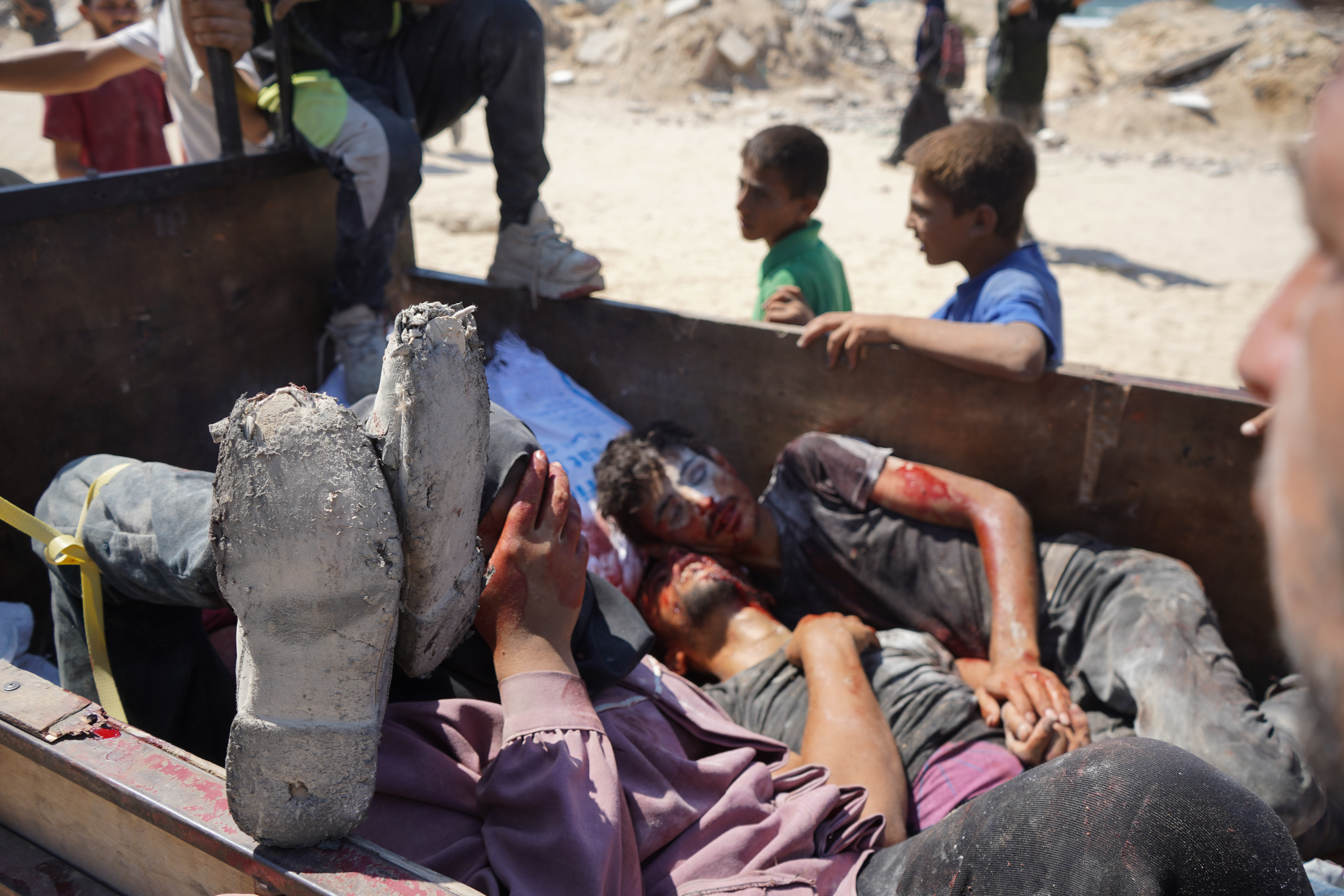 AA-20250801-38724944-38724921-ISRAILIN_ACLIGA_MAHKUM_ETTIGI_GAZZELILER_KISITLI_MIKTARDAKI_UNA_ULASMAK_UZERE_ZIKIMDEKI_YARDIM_DAGITIM_NOKTASINA_GITTI