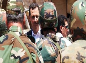 Esed'in ordusu 20 kişinin kafasını kesti