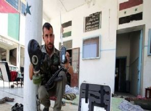 Halep'te rejim güçlerine gaz maskesi dağıtıldı