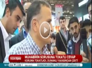 Akit muhabirine destek