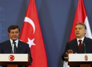 Davutoğlu'ndan Suriye hükümetine yanıt